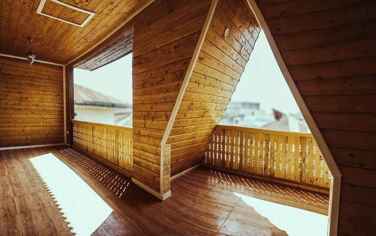 Warm wooden interior under an A-frame roof