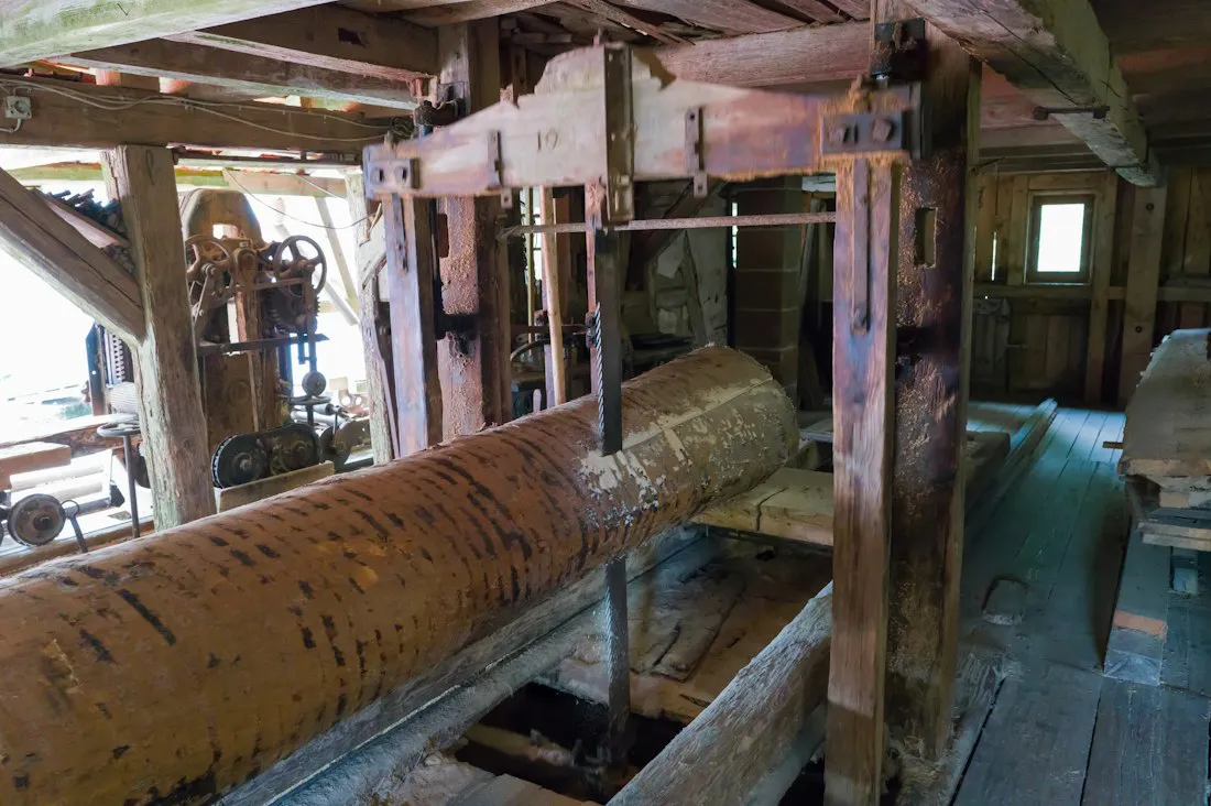 A log being cut at our saw mill